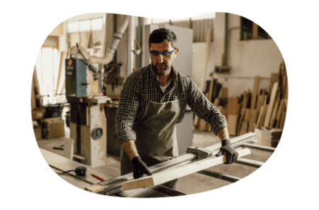 Carpenter working in shop