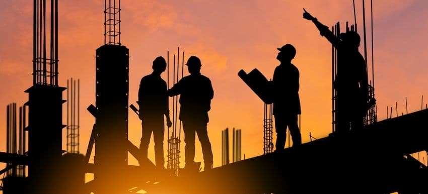 Diverse workers discussing safety
