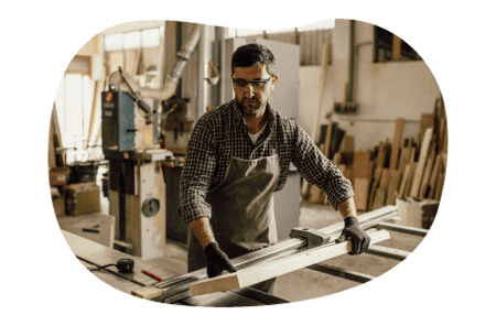 Carpenter working in shop