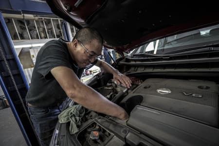 Mechanic working on a vehicle