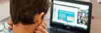 frustrated looking at laptop