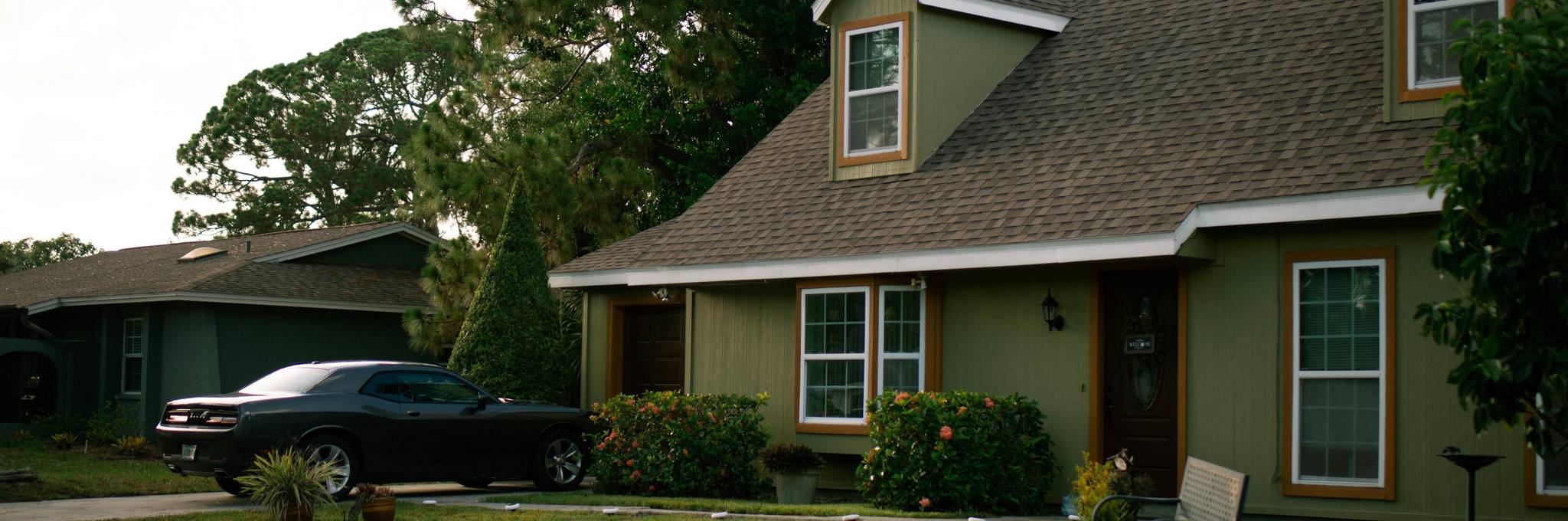 car parked in front of home